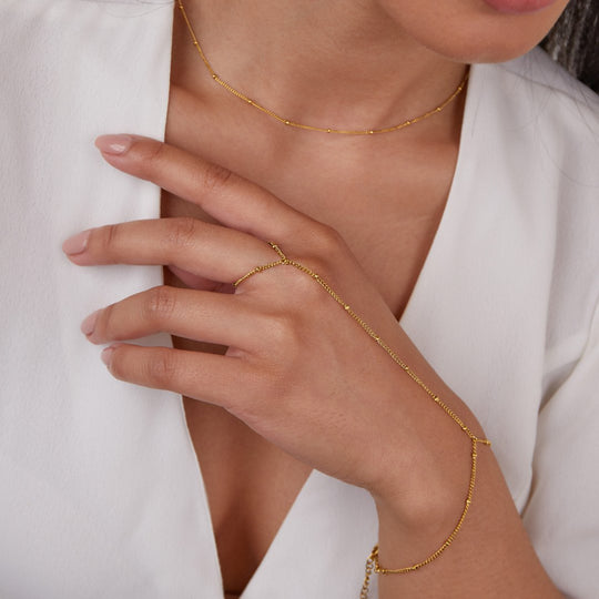 Stilfuld håndkæde armbånd